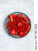 Spicy seasoning, spice, cut from red pepper. Thinly sliced pepper.. Hot red pepper spice. Стоковое фото, агентство Ingram Publishing / Фотобанк Лори