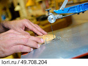 portrait of man cutting a bridge. Стоковое фото, агентство Ingram Publishing / Фотобанк Лори
