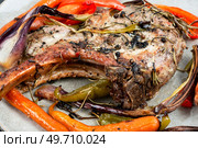 Roasted tomahawk pork meat steak ,close up.. Roasted pork tomahawk steak. Стоковое фото, агентство Ingram Publishing / Фотобанк Лори