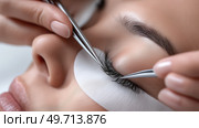 Applying eyelash extensions in a beauty salon during a professional treatment. Наращивание ресниц в салоне красоты во время профессиональной процедуры. Стоковое AI-изображение, AI-художник Katsiaryna Repich / Фотобанк Лори