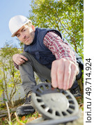 home renovation plumber fixing sewerage. Стоковое фото, агентство Ingram Publishing / Фотобанк Лори