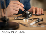 close cropped view of wrist watch being repaired. Стоковое фото, агентство Ingram Publishing / Фотобанк Лори