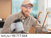 worker plumber using blowtorch for soldering copper fittings. Стоковое фото, агентство Ingram Publishing / Фотобанк Лори