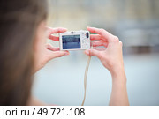 a woman is taking photos. Стоковое фото, агентство Ingram Publishing / Фотобанк Лори