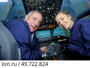 with man and woman pilots. Стоковое фото, агентство Ingram Publishing / Фотобанк Лори