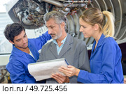 portrait of people and aircraft specification file. Стоковое фото, агентство Ingram Publishing / Фотобанк Лори