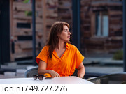 Daydreaming During Coffee Break at a Modern Cafe in Downtown. Стоковое фото, фотограф Aleksandr Golubev / Фотобанк Лори