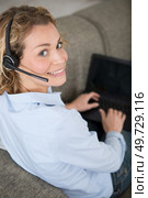 happy young woman working from home. Стоковое фото, агентство Ingram Publishing / Фотобанк Лори