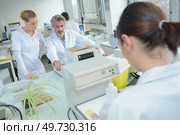 concept of the laboratory interns. Стоковое фото, агентство Ingram Publishing / Фотобанк Лори