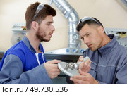 equipment cables and piping in an industrial power plant. Стоковое фото, агентство Ingram Publishing / Фотобанк Лори