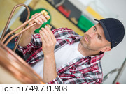 cooper wire being assembled together. Стоковое фото, агентство Ingram Publishing / Фотобанк Лори