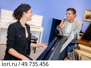 testing the tune of the grand piano. Стоковое фото, агентство Ingram Publishing / Фотобанк Лори