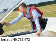 glider pilot ready to control. Стоковое фото, агентство Ingram Publishing / Фотобанк Лори