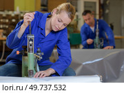 an industrial technician at work. Стоковое фото, агентство Ingram Publishing / Фотобанк Лори