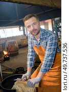 a man barrel making procedures. Стоковое фото, агентство Ingram Publishing / Фотобанк Лори