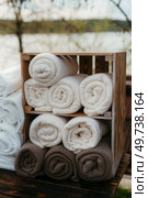 white plush blankets in wooden boxes for event invitees. Стоковое фото, агентство Ingram Publishing / Фотобанк Лори