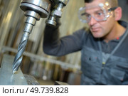 drilling and boring machine setter. Стоковое фото, агентство Ingram Publishing / Фотобанк Лори