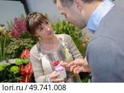 taking care for a bud. Стоковое фото, агентство Ingram Publishing / Фотобанк Лори