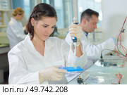 she is searching for new medicine. Стоковое фото, агентство Ingram Publishing / Фотобанк Лори