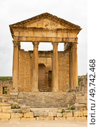 Ruins of ancient Roman capitol on territory of antic city of Dougga in area of modern Tunisia. Стоковое фото, фотограф Яков Филимонов / Фотобанк Лори