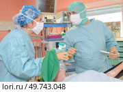 doctors in the operating room. Стоковое фото, агентство Ingram Publishing / Фотобанк Лори
