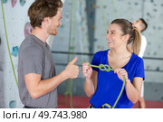 young couple in love climbers. Стоковое фото, агентство Ingram Publishing / Фотобанк Лори
