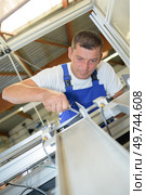 a maintenance sheet metal worker. Стоковое фото, агентство Ingram Publishing / Фотобанк Лори