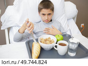little boys bored from sick hospital food. Стоковое фото, агентство Ingram Publishing / Фотобанк Лори