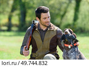hunters with dogs hunting a bird woodcock. Стоковое фото, агентство Ingram Publishing / Фотобанк Лори