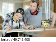 male and woman joiners in workshop. Стоковое фото, агентство Ingram Publishing / Фотобанк Лори