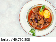 Stewed deer goulash in sauce, venison goulash. Venison ragout. Copy space. Space for text.. Roast venison with potatoes. Стоковое фото, агентство Ingram Publishing / Фотобанк Лори