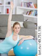 woman exercising with an aerobic ball. Стоковое фото, агентство Ingram Publishing / Фотобанк Лори