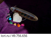 seven chakras signs and stone heart with flower of life pattern. seven chakras stones, energy healing concept. Стоковое фото, агентство Ingram Publishing / Фотобанк Лори