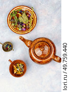 Various kinds of herbal tea. Natural remedy, herbal medicine. Flat lay.. Herbal tea and dried herbs. Стоковое фото, агентство Ingram Publishing / Фотобанк Лори