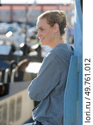 woman staring at the factory outdoor site. Стоковое фото, агентство Ingram Publishing / Фотобанк Лори