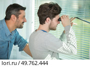 curious men stalking or snooping secrets. Стоковое фото, агентство Ingram Publishing / Фотобанк Лори