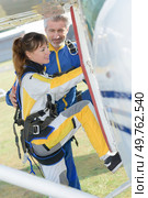 woman preparing to board the aircraft. Стоковое фото, агентство Ingram Publishing / Фотобанк Лори