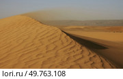 Sand blowing over sand dunes in wind. Стоковое фото, фотограф Михаил Коханчиков / Фотобанк Лори