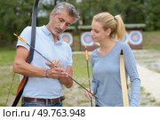 portrait of couple doing the fletching. Стоковое фото, агентство Ingram Publishing / Фотобанк Лори
