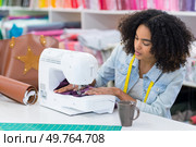 fashion designer with sewing pattern. Стоковое фото, агентство Ingram Publishing / Фотобанк Лори
