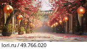 A street with abundant trees and lanterns lining the sidewalks, creating a picturesque scene.. Tree-Lined Street With Lanterns. Стоковое фото, агентство Ingram Publishing / Фотобанк Лори