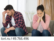 beautiful young couple has had a quarrel at home. Стоковое фото, агентство Ingram Publishing / Фотобанк Лори