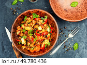Vegan Ratatouille is a bright vegetable stew made from fresh fried vegetables.. Ratatouille, vegetable dish. Стоковое фото, агентство Ingram Publishing / Фотобанк Лори