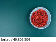 Dried Goji Berries in Bowl, Healthy Food, Superfood. Space for text.. Goji berry, strengthening the immune system. Стоковое фото, агентство Ingram Publishing / Фотобанк Лори