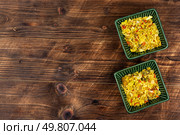 Aromatic, colorful, vibrant spices and herbs. Bowls filled with spices. Ingredients for cooking. Space for text.. Bowls with colorful powders and spices. Стоковое фото, агентство Ingram Publishing / Фотобанк Лори
