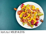 Vegan dish of rhubarb and grilled bell peppers, seasonal vegetarian kebab on skewers. Copy space.. Vegetable rhubarb kebab. Стоковое фото, агентство Ingram Publishing / Фотобанк Лори