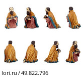 Christmas crib isolated on white statuettes representing a King. Стоковое фото, агентство Ingram Publishing / Фотобанк Лори