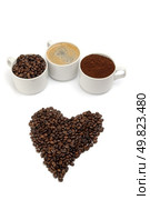 cups with coffe beans, blend and espresso. closeup. Стоковое фото, агентство Ingram Publishing / Фотобанк Лори