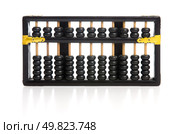 Old wooden abacus on white background with reflextion. Стоковое фото, агентство Ingram Publishing / Фотобанк Лори