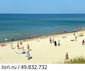 Sandy beach on Curonian Split , Morskoe villlage , Russia, (2024 год). Редакционное фото, фотограф Татьяна Кахилл / Фотобанк Лори